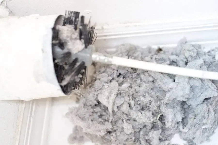 Clogged dryer vent with dangerous lint buildup in Los Angeles - Elite Air Services professional cleaning needed